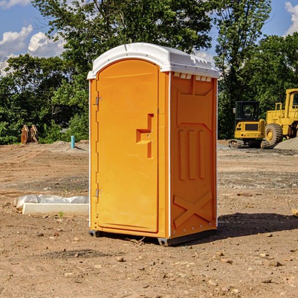 how often are the portable restrooms cleaned and serviced during a rental period in Pine Island Minnesota